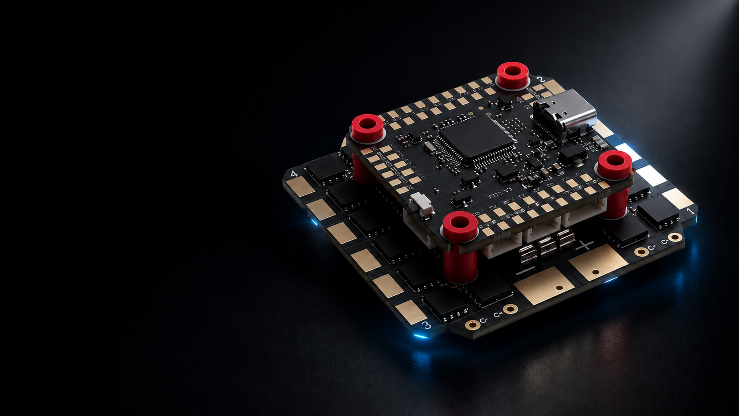 A high-tech electronic circuit board with a black PCB, gold-plated contacts, and four prominent red cylindrical components, illuminated by blue LED lights on a dark reflective surface.