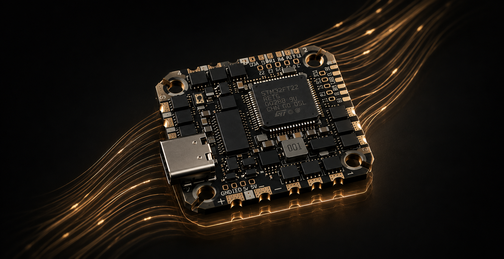 A compact electronic circuit board with a central microchip, USB-C connector, and gold-plated pins, shown on a black background with glowing golden light streaks.