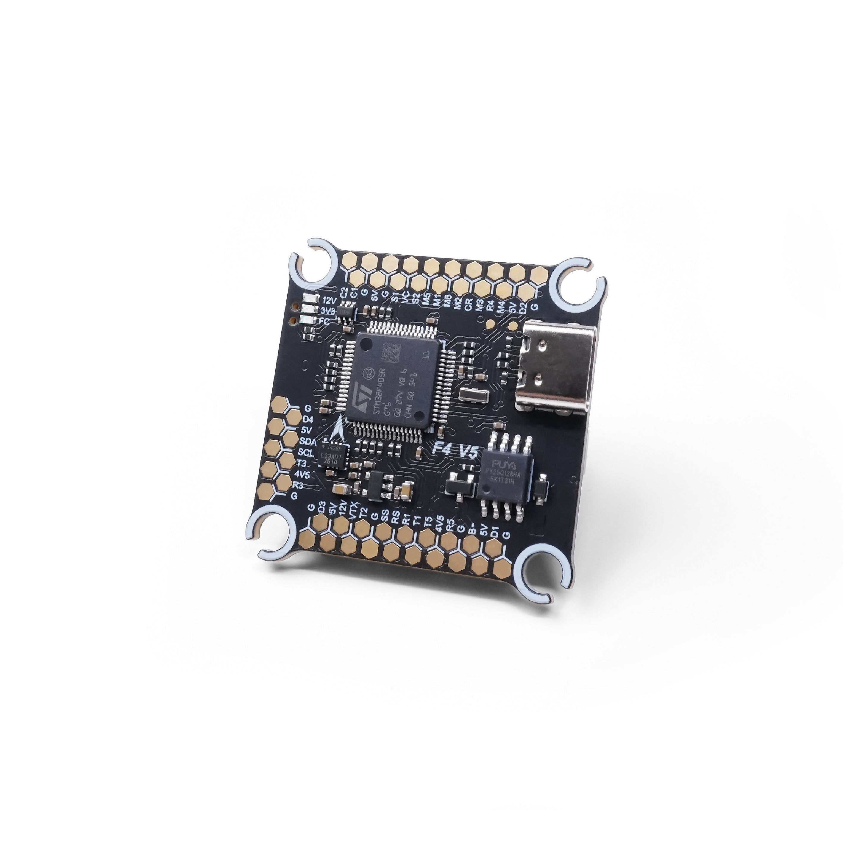 A square electronic microcontroller board with a black PCB, gold-plated pins, a USB-C port, and silver metal corner brackets, photographed on a clean white background.